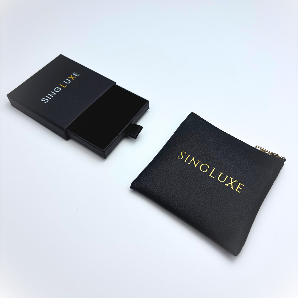 Embalagem elegante da Singluxe com bolsa e caixa – apresentação premium para joias de luxo
